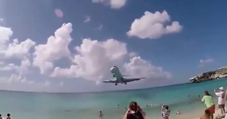Airplane Clears Beachgoers' Heads By Just A Few Feet