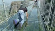 Tourists Brave Glass-Bottom Bridge