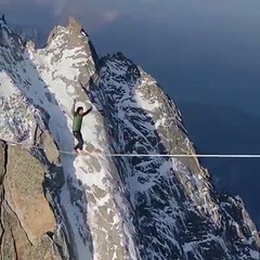 Amazing rope stunt between two mountain