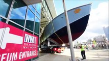 Restored PT boat travels through streets of New Orleans