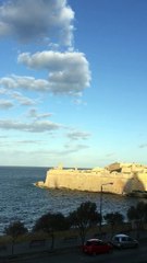 still object hiding in a cloud starts moving fast vanishing in clear sky Valletta,MT,12.11.2016.