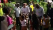 Harry blows bubbles with children in Antigua and Barbuda