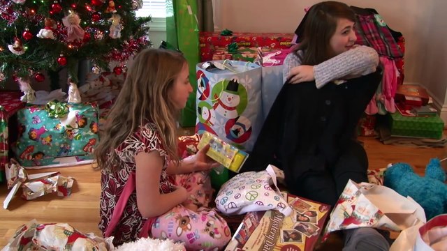 Girls Opening Presents on Christmas Day - Happy New Years - Reality Video