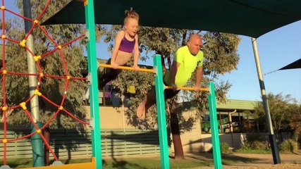 Un papa essaie de copier les figures de gym de sa fille