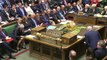 May defends ID checks as Corbyn questions health tourism