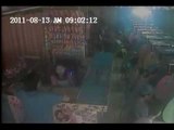 Man caught stealing on the counter CCTV @ 9:00 AM 08/13/2011