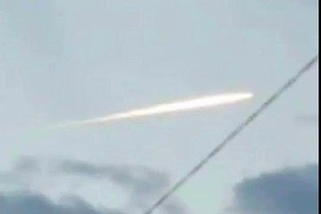 MOMENTS AFTER THE EARTHQUAKE THIS UFO OR METEOR APPEARS IN THE SKY OVER JAPAN
