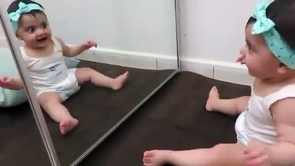 BABY INFRONT OF MIRRIR-CUTENESS OVERLOADED