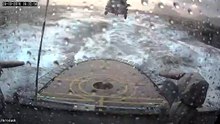 Вертолет ВВС Дании совершает посадку в тежелых погодных условиях