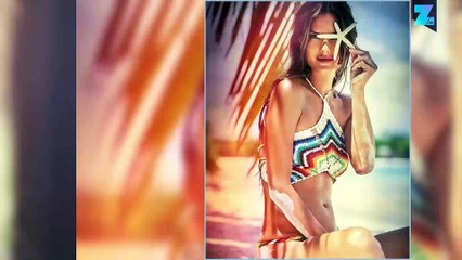 Alessandra gets naked for jaw-dropping swimwear ad