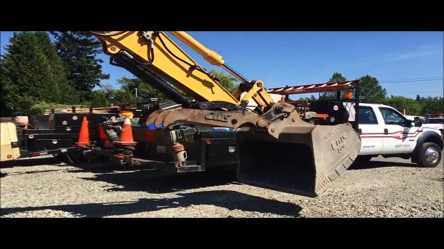 John Deere 120C excavator test for working