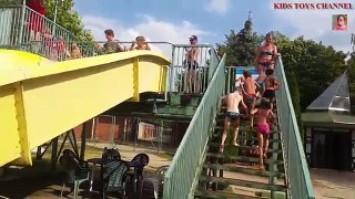Slides for kids in water park with big elephant. Funny video from KIDS TOYS CHANNEL