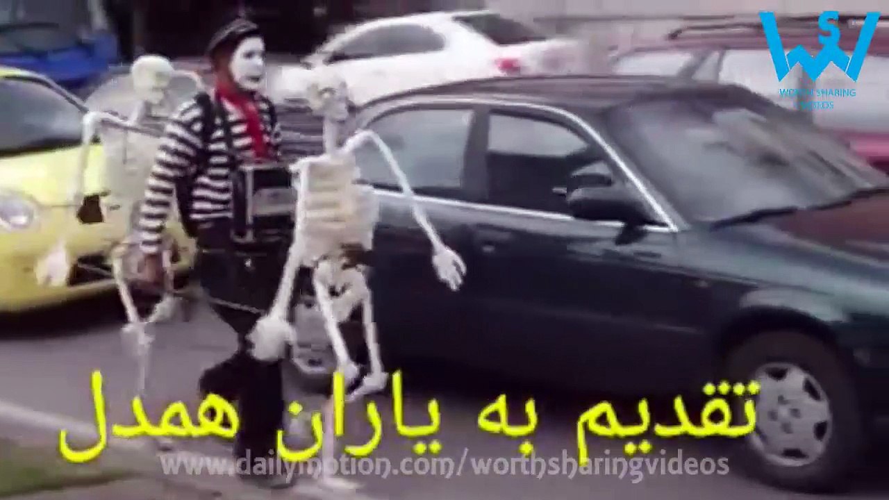 Funny man dancing with skeletons