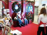 Military dad surprises children visiting mall Santa