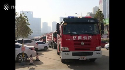 Four 'spider men' rescue residents trapped in skyscraper on fire