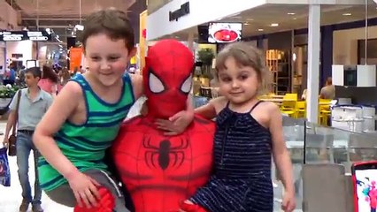 Superhero Spider-Man in Real Life Walking Around The Mall And Makes Selfy