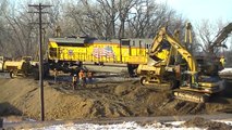 TRAIN DERAILS ! Workers put derailed train back on tracks