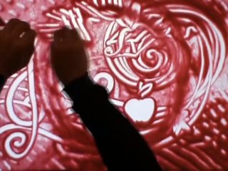 sand drawing Merry Christmas