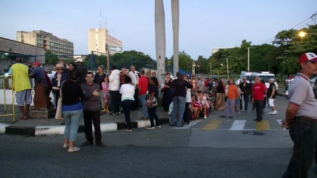 Crowds gather in Havana's Revolution Square to mourn Castro