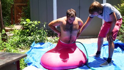 6ft Man in 6ft Giant Water Balloon - 4K - The Slow Mo Guys