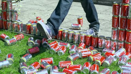 Crashing through 200 Coke Cans - The Slow Mo Guys