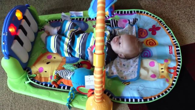 6-week Old Baby Playing with Fisher-Price Discover n Grow Kick & Play Piano Gym