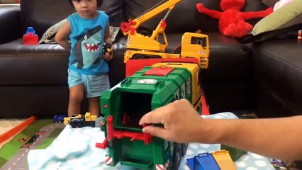 Download Video: Toy Trucks - BRUDER Garbage Truck for Kids: Sanitation Truck Lego Mess Unboxing Family Toy Review