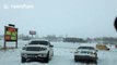 Multiple vehicles stuck in snow during storm