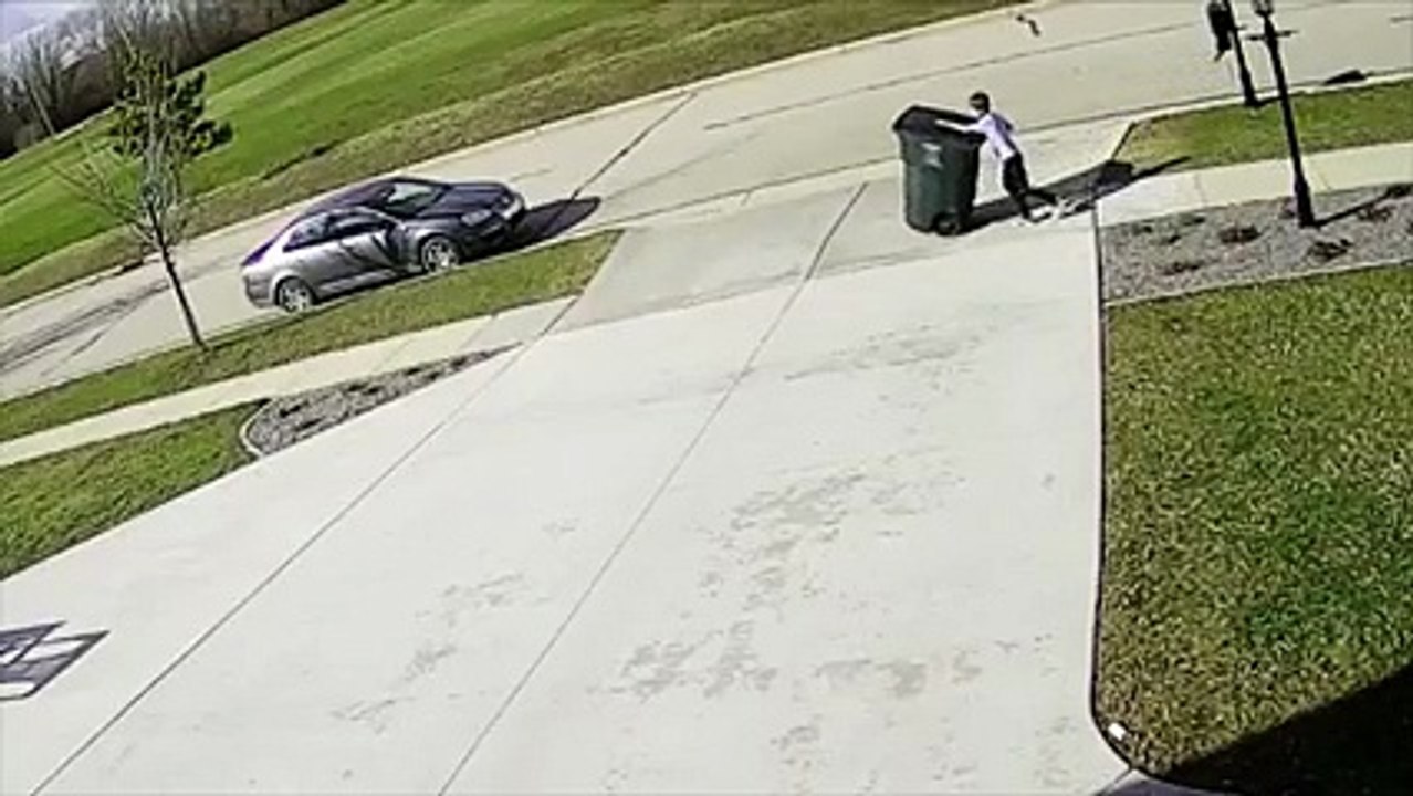 Kid Has Epic Fight With Garbage Bin