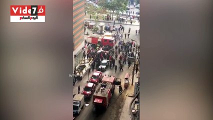 قراء يشاركون بصور وفيديو جديد لحريق عشش بعقار فى مصر الجديدة