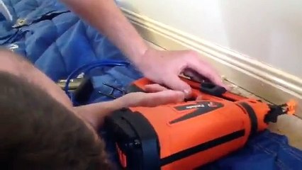 Checking Wall Moisture by Sunstate Cleaning