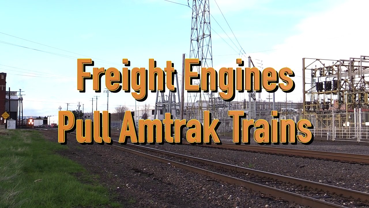Freight Engines Pull Amtrak Trains