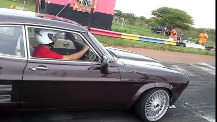 Ford Capri 2jz 12,2s @191kmh in the rain with clutch slipping and soft lunch