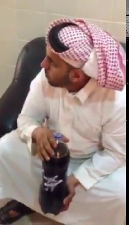 Arabi person eating uncooked chicken