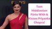 Tom Hiddleston Flirts With & Kisses Priyanka Chopra at Emmy's!