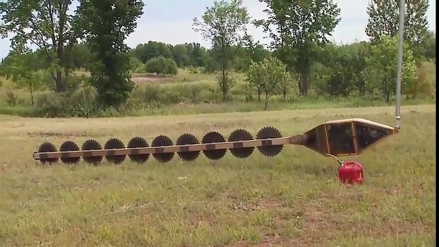 Awesome Helicopter air saw trimming trees - Helicopter trimming trees by high tensions lines