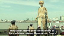 Giant puppet parades in Myanmar's Yangon region