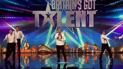 A boy is singing when staff bursts