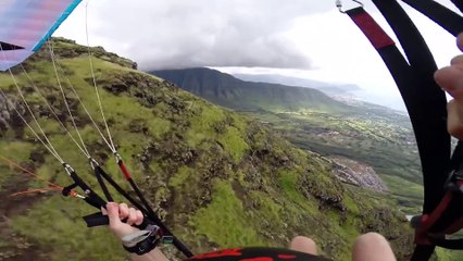 Paragliding through a tiny gap between two buildings!! (People are Awesome)