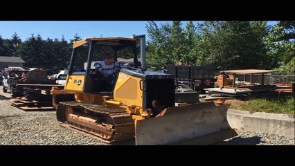 Deere 450J tractor 6-way dozer demo