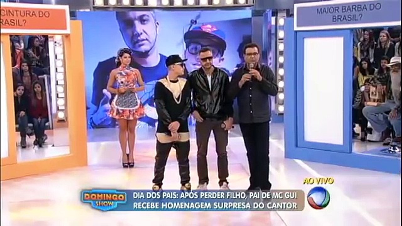 10_08_2014 - MC Gui faz homenagem ao pai no Domingo Show