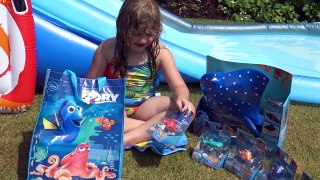 Finding Dory Movie Surprise Toys + Giant inflatable Water Slide | The Disney Toy Collector