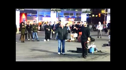 Busking at Yonge and Dundas Square.