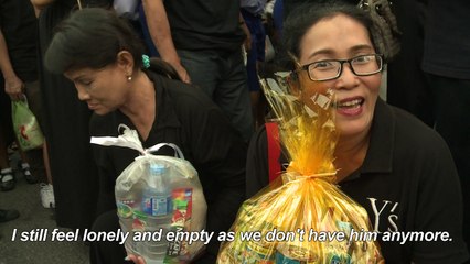 Mass display of grief on late Thai king's birthday