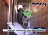 سكان حي هنانو يتفقدون منازلهم