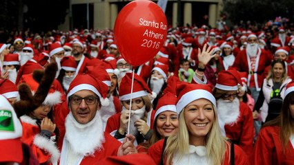 Festive fun as sea of Santas hits Athens' streets