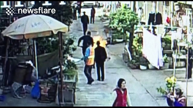 Brave man drags flaming gas cylinder to 'stop it exploding' near people