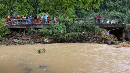 Over a dozen dead in southern Thailand as floods threaten tourist season