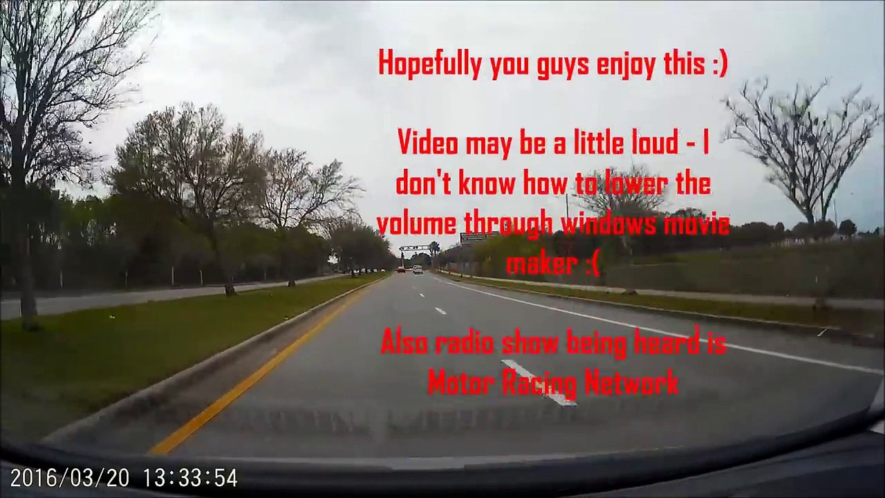 Car waiting at railway crossing has honk-off with train