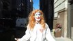 Clowns spread love in NYC on an electric bike